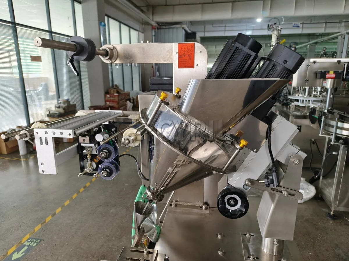 Packaging machine photographed in a workshop setting